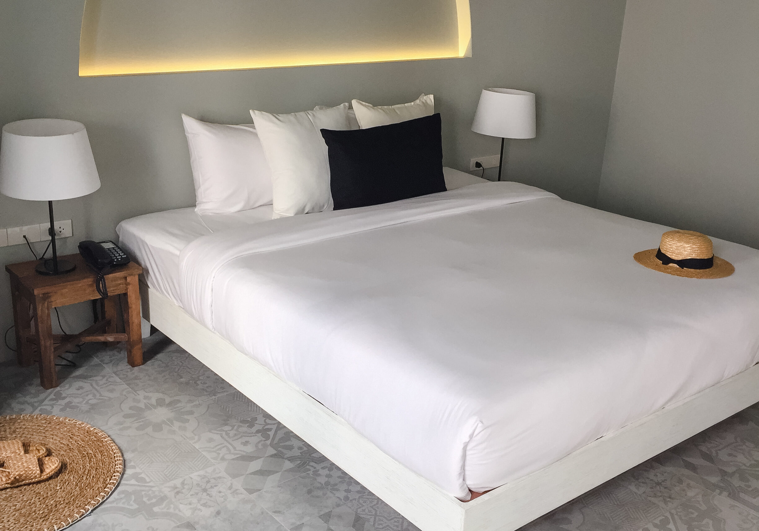 Clean hotel room with wooden bunk beds. Vintage effect style pictures.
